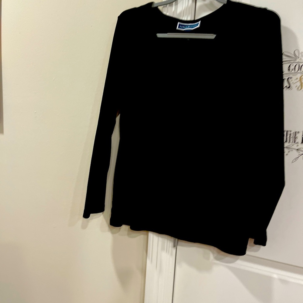Black long sleeve top , freshly washed and in good condition.